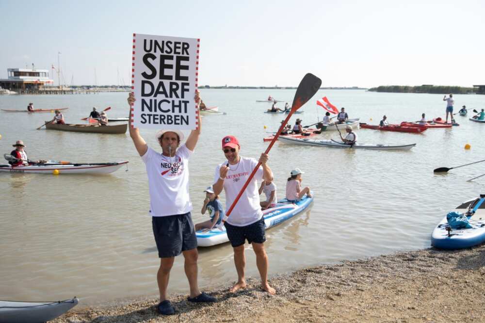 Last month over 100 people staged a rally to sound the alarm, some holding posters reading, 'Our lake must not die.'