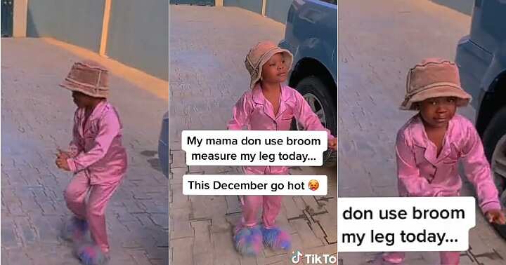 Little girl dances, broom stick to measure leg