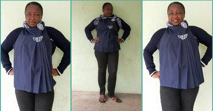 Nigerian mother spotted rocking daughter's uniform