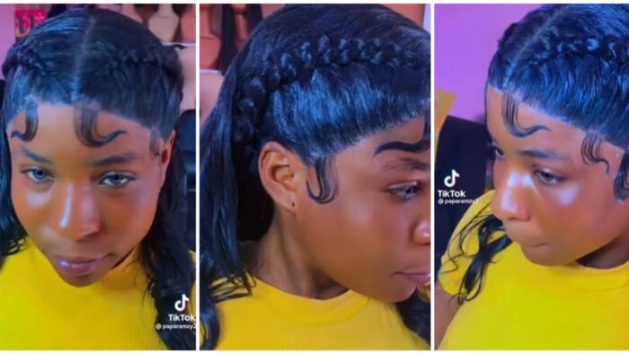 Netizens amused over viral video of lady flaunting her laid edges on lace front wig