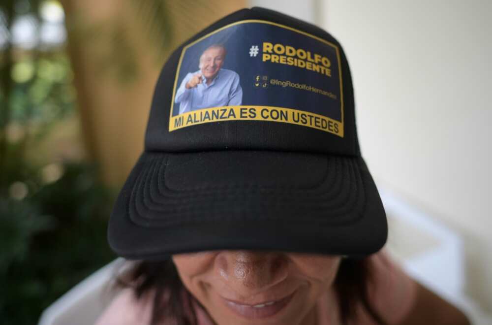 A woman wears a cap with the image of Colombian presidential candidate  Rodolfo Hernandez, in Bucaramanga, Colombia on June 18, 2022