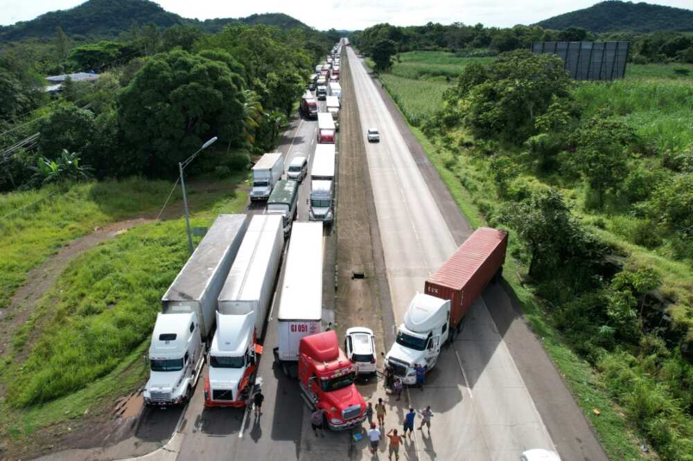 Protesters have blockaded important roads with trucks and burning barricades Protesters have blockaded important roads with trucks and burning barricades