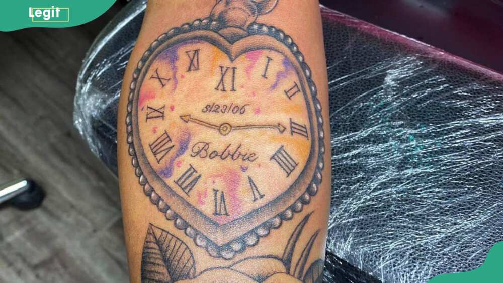 Love clock tattoo