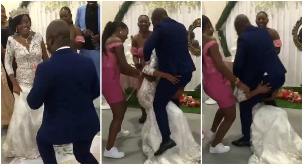 Photos of the moment a groom jumped on his wife during wedding dance.