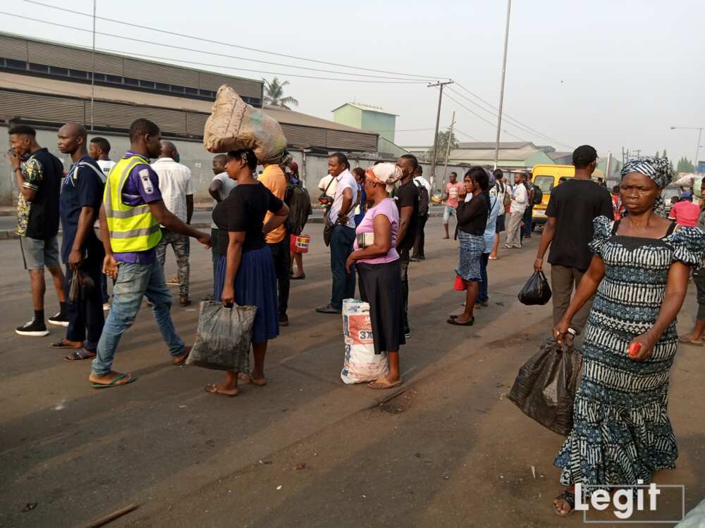 Commuters stranded due to hike in transport fare at Ojota-Oregun road, Ojota, Lagos. Photo credit: Esther Odili