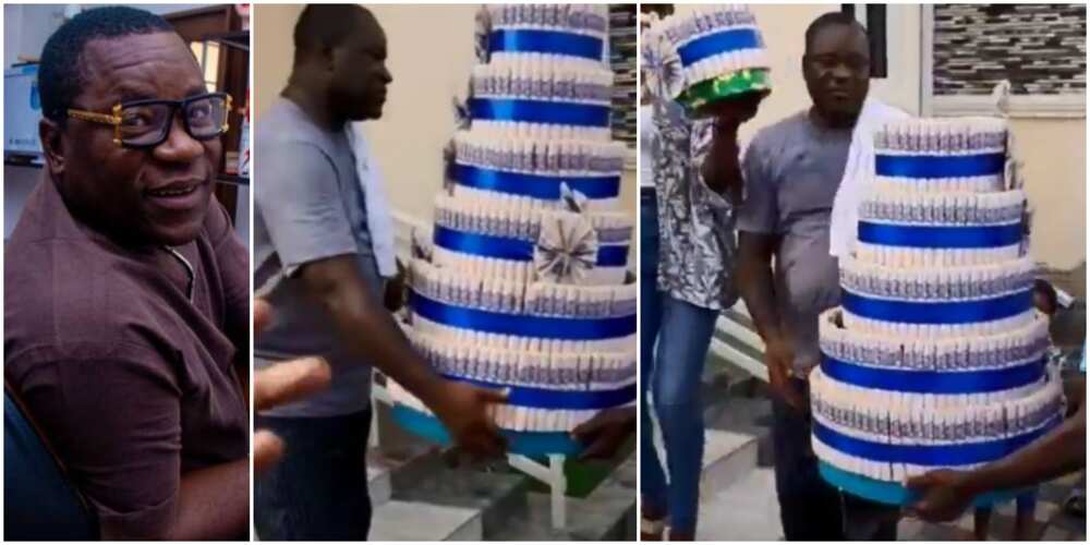 Actor Aina Gold’s Family Surprise Him With 7-Tier Money Cake on His Birthday as Talking Drummers Praise Him