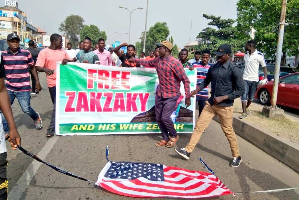 U.S-Iran conflict: Shi’ites protest in Abuja, burn American flag