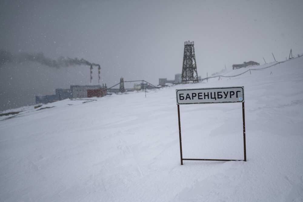 A coal plant spews out black smoke in the Russian mining settlement of Barentsburg on Norway's Spitsburgen