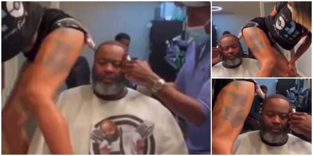 The man is enjoying; Nigerians react to video of female barber cutting man's hair with clipper in her backside