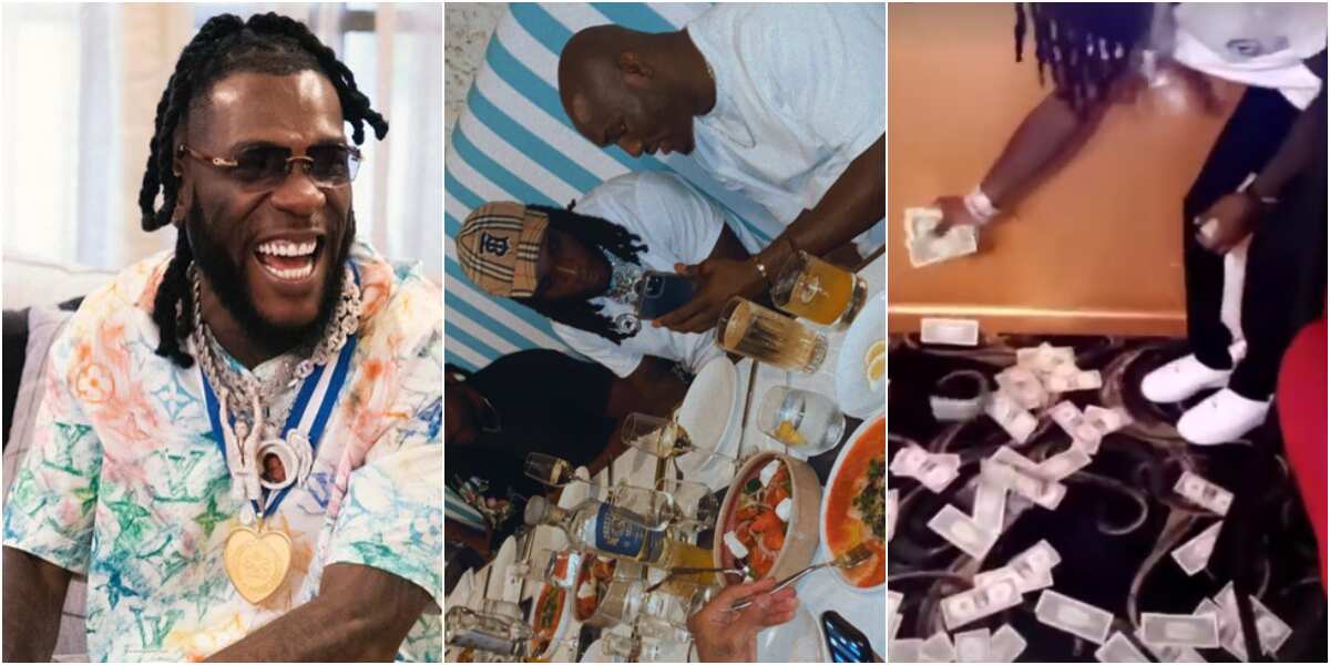 Burna Boy at 30: Singer decorates dance floor with hard currencies as he parties with friends