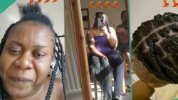 Nigerian man saves his wife £100 in UK, video shows him braiding her hair himself, melts hearts