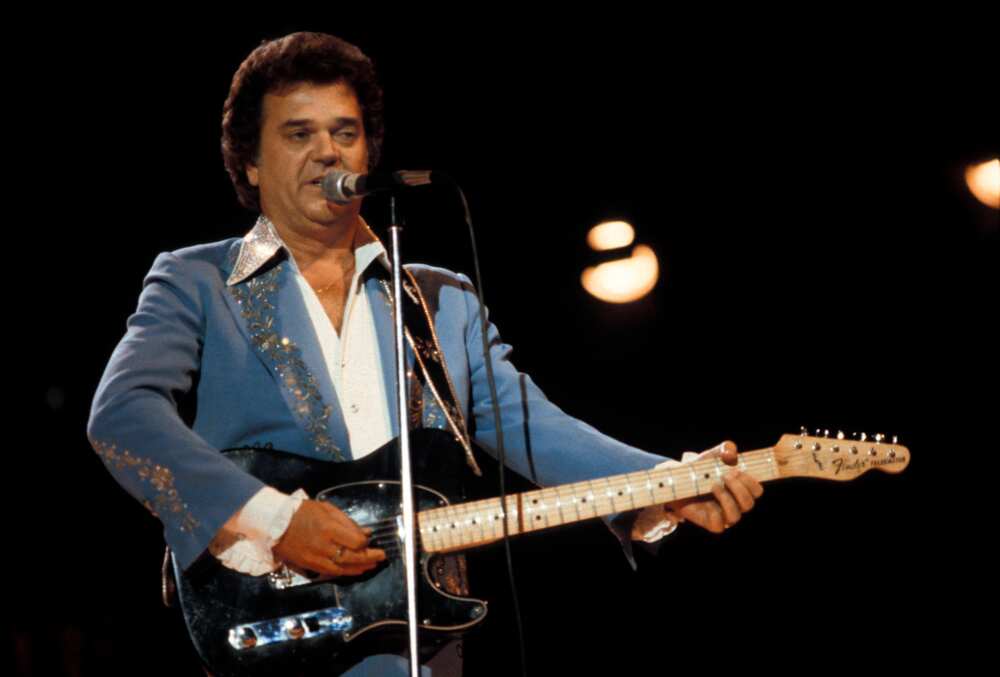 The late singer Conway Twitty perfoming on stage