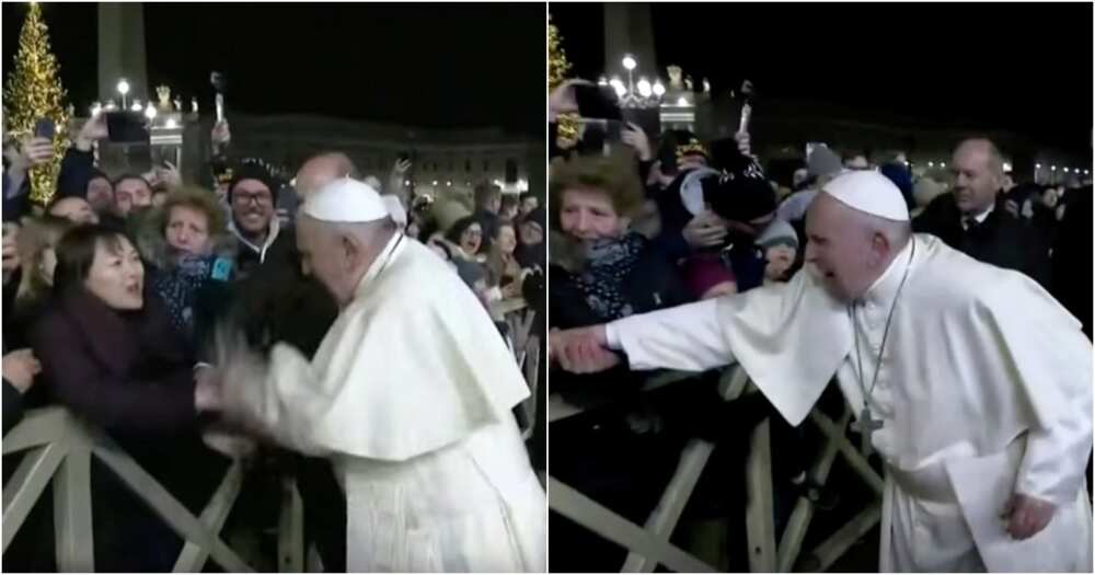 Disgruntled Pope Francis slaps woman's hand to free himself from her grip