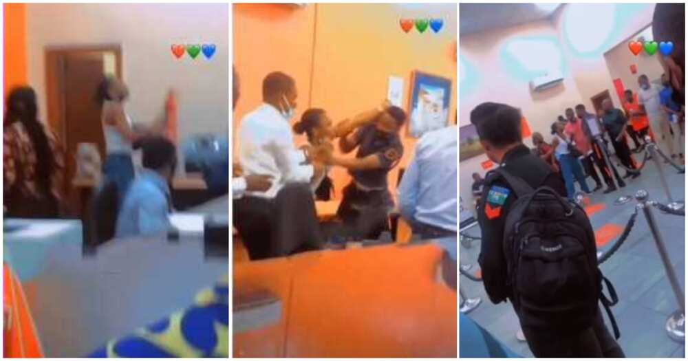 Nigerian lady, scares bankers, climbs counter