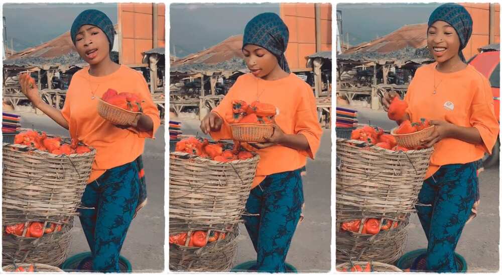 Photos of a beautiful lady selling fresh pepper.