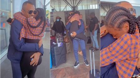 "I need to slim down": Nigerian man carries girlfriend like a baby as she welcomes him at airport in video