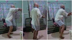 Girl runs away as dad in grey shorts scatters house with very nice acrobatic dance, stunning video goes viral