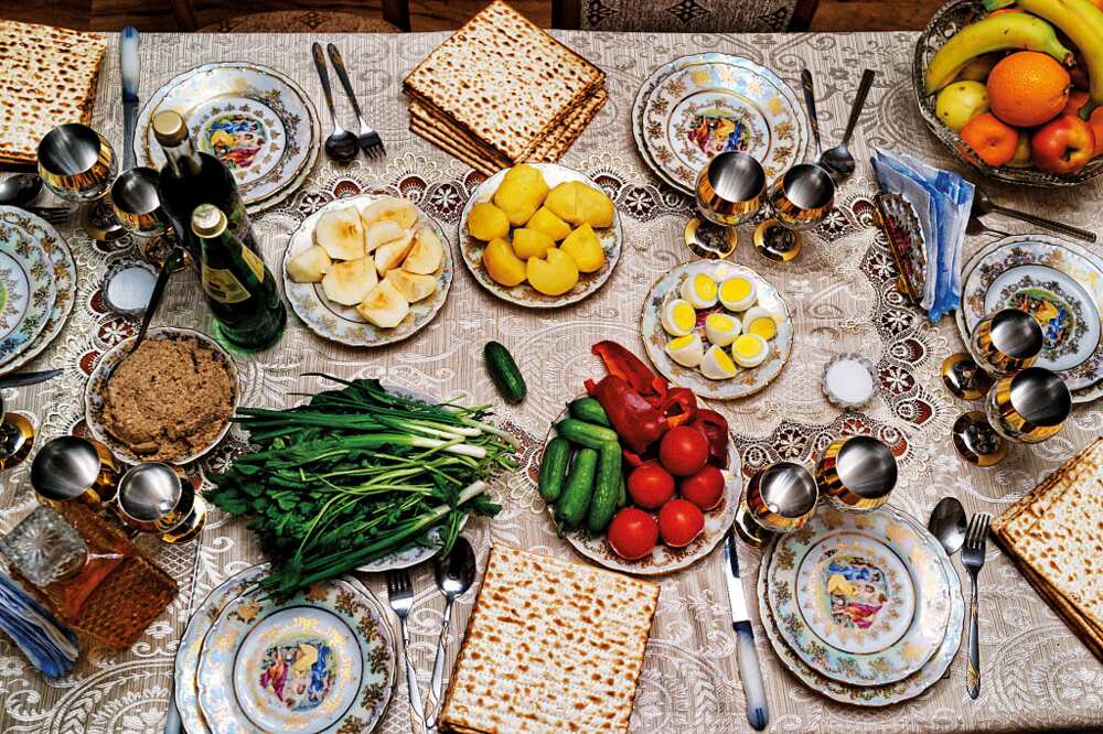 The Passover Seder table is at the home of Nisim Nisimov