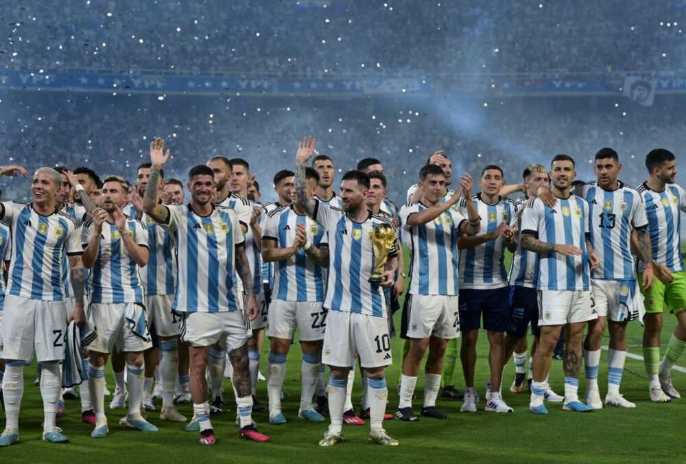 Lionel Messi (center) won the World Cup with Argentina in 2022 at the fifth time of asking