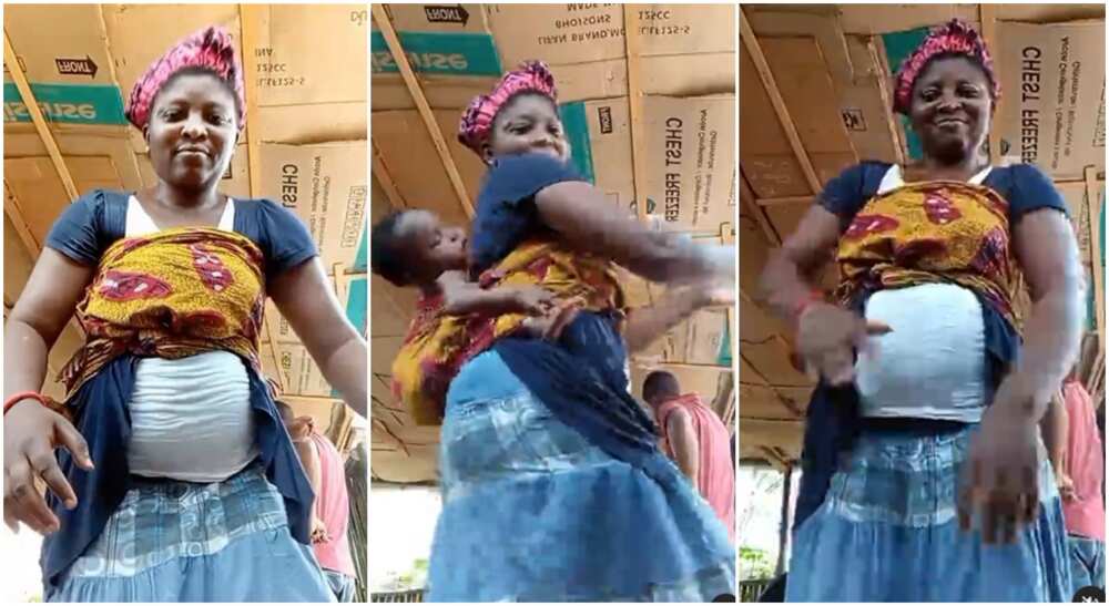 Nigerian mum seen catching fun on Tiktok on Mothers' Day with her baby on her back.