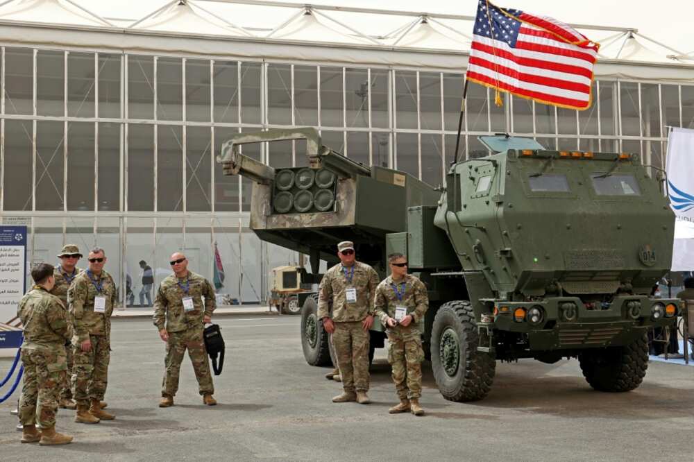 US military personnel stand by a M142 High Mobility Artillery Rocket System (Himars) during Saudi Arabia's first World Defense Show in March 2022 -- Washington is sending four more Himars to Ukraine