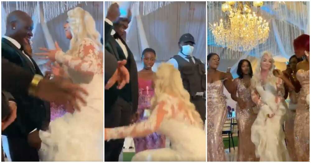 Video shows pretty Oyinbo bride in heels dancing with her waist at her wedding to a Nigerian man