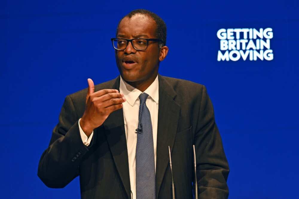 Finance mnister Kwasi Kwarteng's  decision to scrap a controversial plan to cut the top rate of income tax helped lift sterling