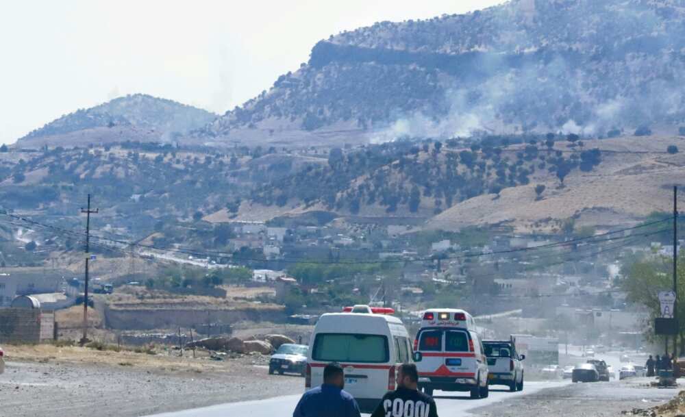 Smoke billows on the horizon in the village of Zrgoiz, 15 kms outside the Iraqi city of Sulaimaniyah, where the bases of several Iranian opposition groups are located, on September 28, 2022