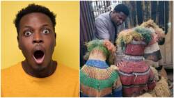 Photo captures moment 3 masquerades kneel before a pastor for prayers, 'give their lives to Christ'