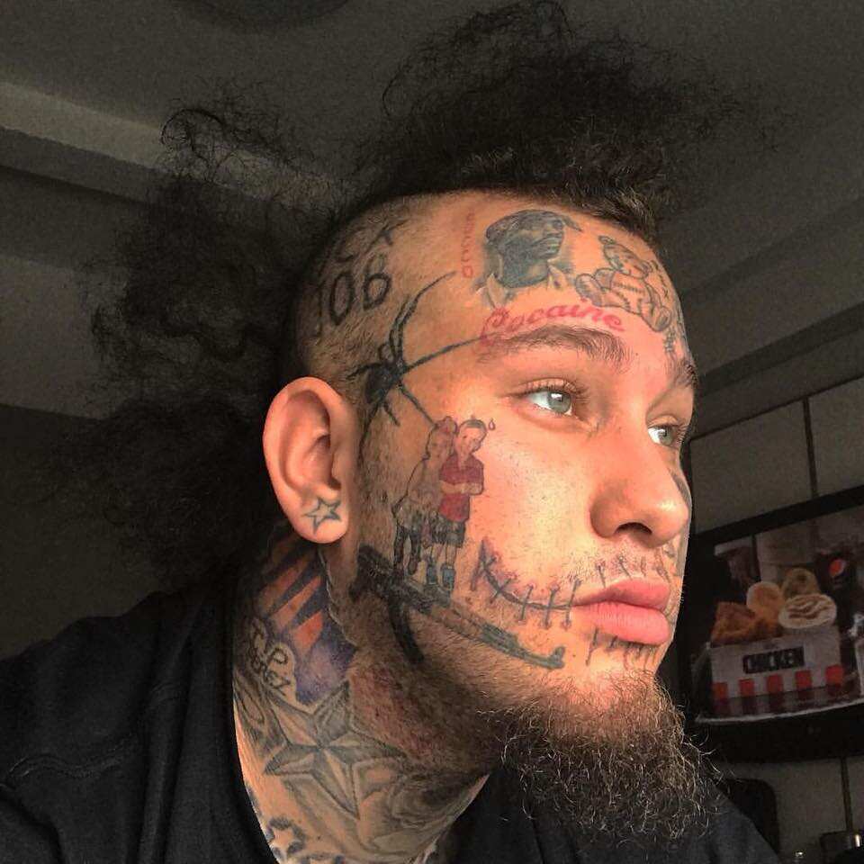 Tattooed gangster rapper dubbed Stitches arrested for stashing gun and  drugs in his car after he was caught parking in disabled space  The  Scottish Sun