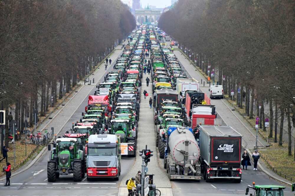 The protesters blocked one of the main roads through central Berlin near the Brandenburg Gate, dumping manure on the road