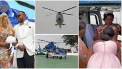 Bride flies to her wedding in helicopter, rocks ankara wedding gown at plush ceremony