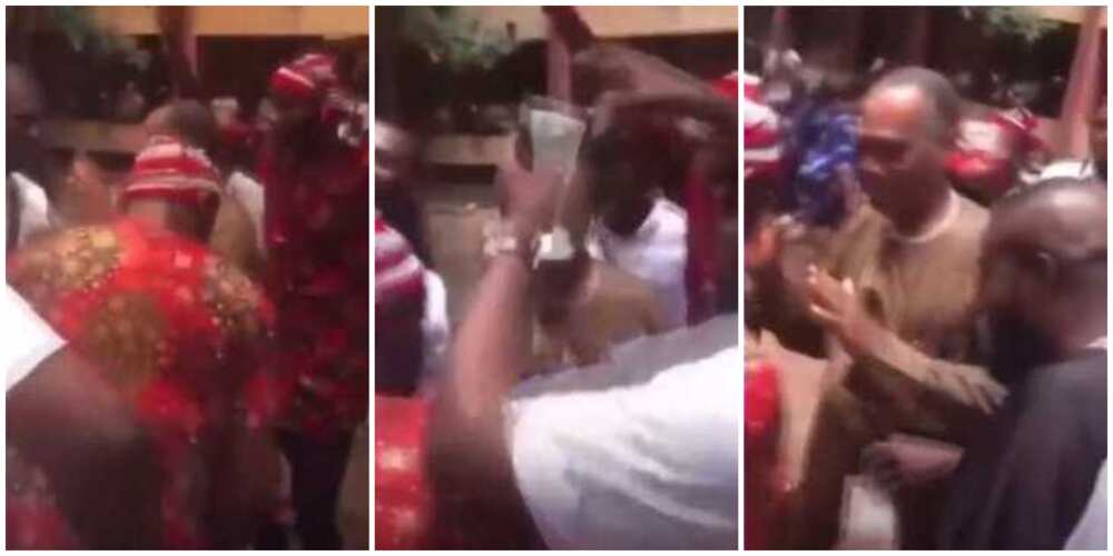 Reactions as FUTO graduates corner their lecturer, dance and spray him cash in cute video