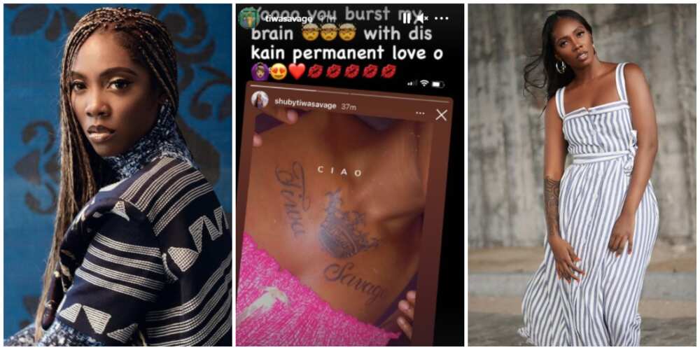 Singer Tiwa Savage reacts as fan tattoos her name on her chest