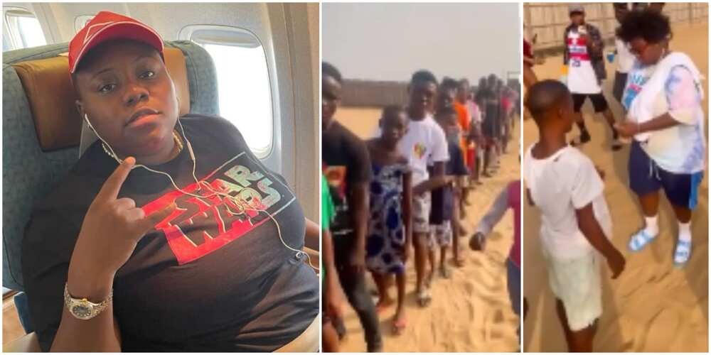 Teni shares money at the beach.