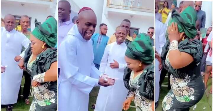 Bishop sprays money, woman dances buga