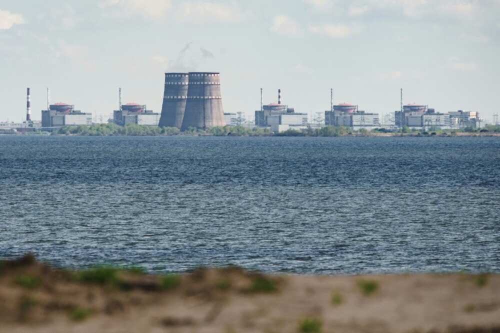 In this file photo taken on April 27, 2022 a general view shows the Zaporizhzhia nuclear power plant, situated in the Russian-controlled area of Enerhodar, seen from Nikopol