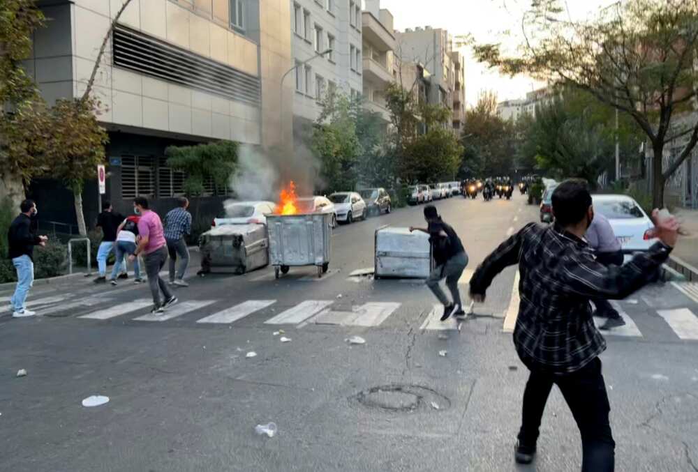 A picture obtained by AFP outside Iran shows a bin burning in a Tehran street during the protests over Mahsa Amini's death