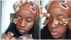 Lady creates hilarious-looking ankara eyelashes, netizens amused over viral video