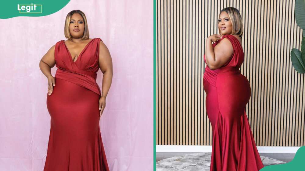 A plus size woman in a burgundy gown