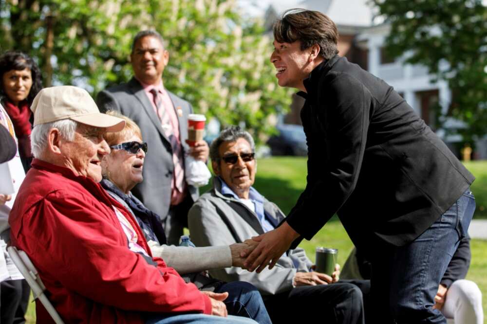 Chief Mark Hill, of the Six Nations of the Grand River, greets residential school survivors during a commemorative tree planting ceremony in Brantford, Ontario, Canada, on May 24, 2022