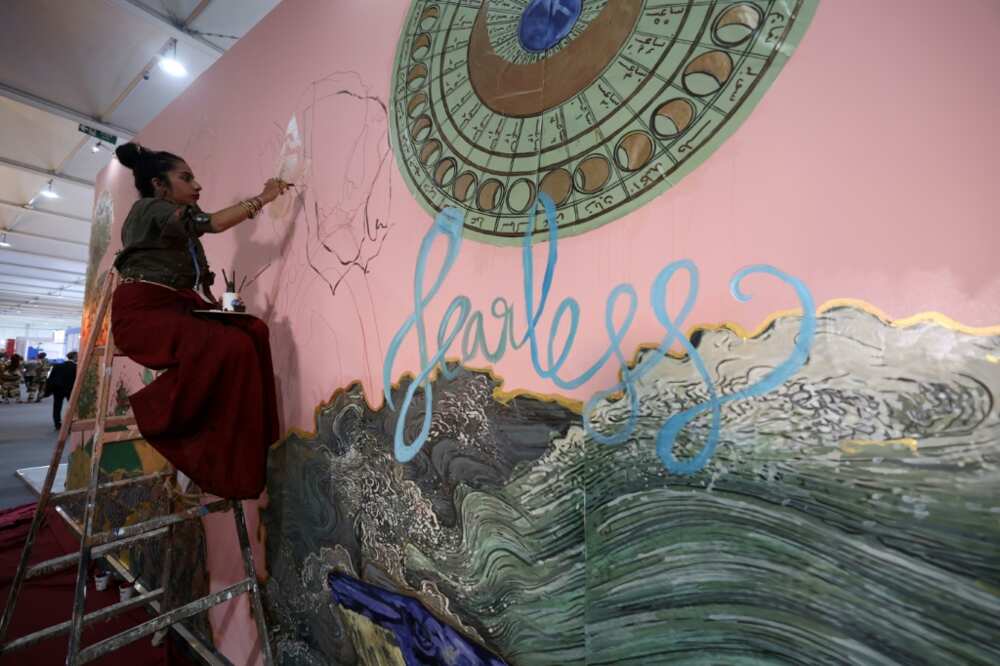 Award-winning Indian artist Shilo Shiv Suleman painted a mural called "fearless" at the youth pavillon, during the COP27 climate summit in the Red Sea resort of Sharm el-Sheikh