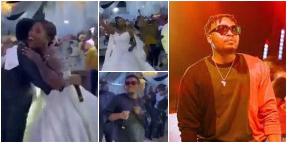 Reactions as singer Olamide surprise couple at their wedding with live performance, the bride jumped in the video