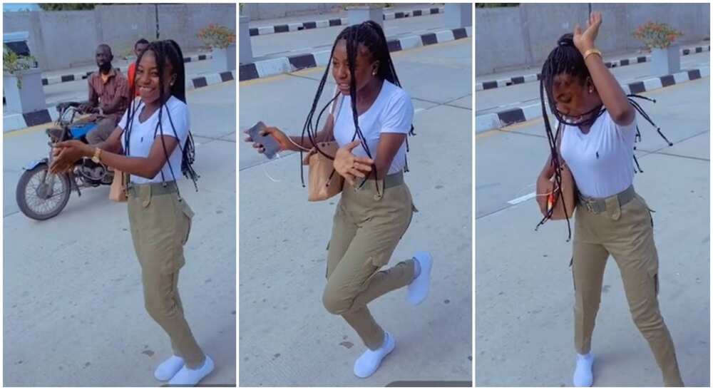 Nigerian lady in NYSC uniform jumps on Buga by Kizz Daniel in the middle of the road.