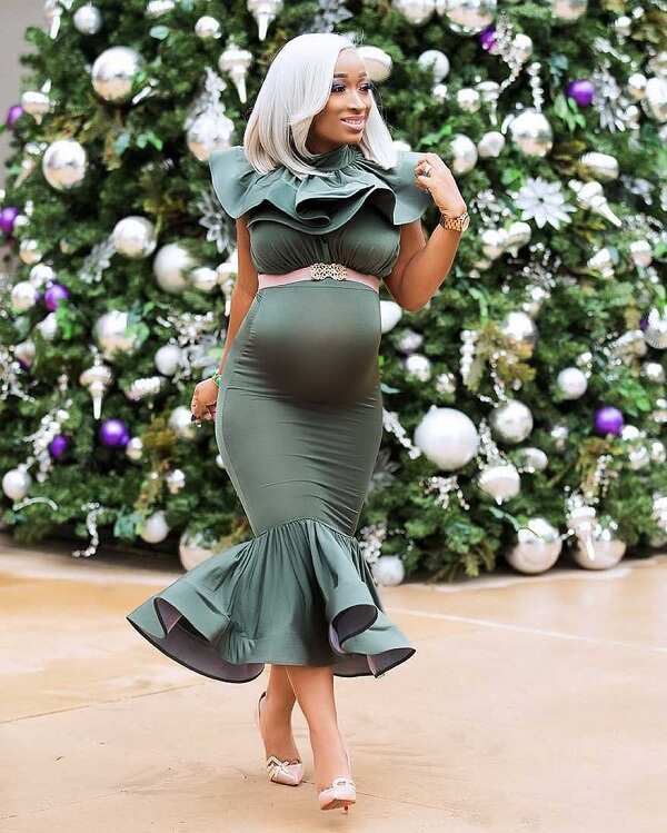 Maternity festive gown with flounces