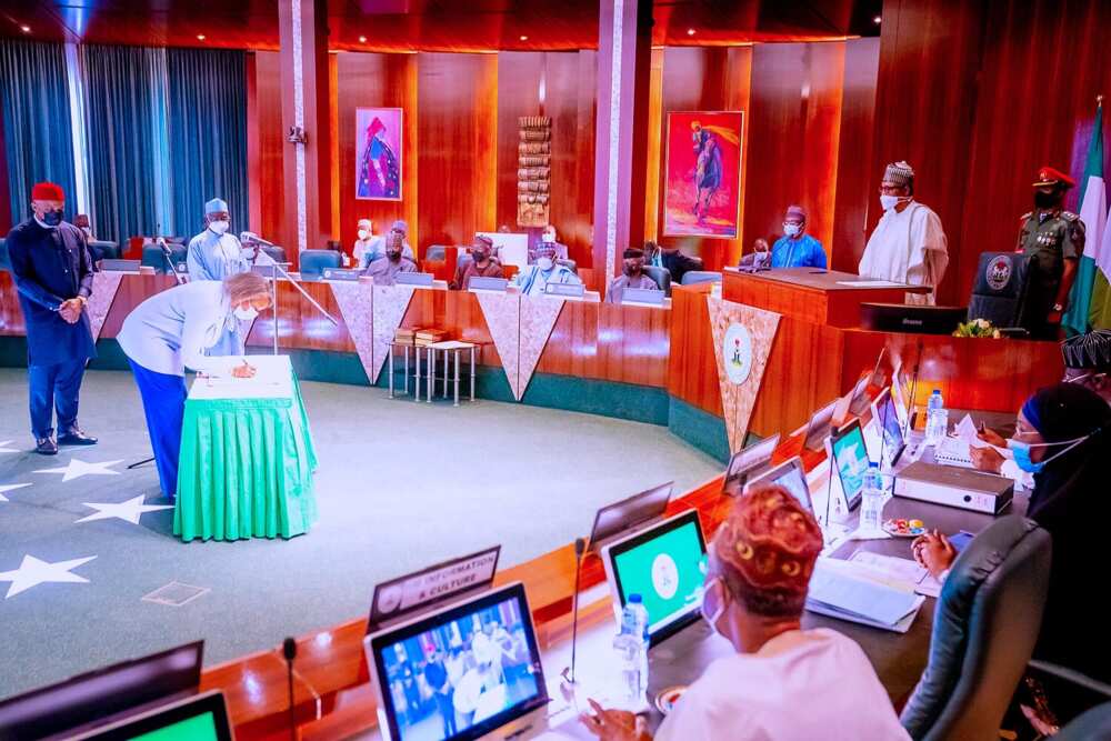 President Buhari swears in 6 new INEC commissioners, assigns portfolios