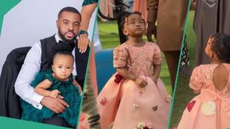 Williams Uchemba's 2-year-old daughter dances with Igbo traditional music group, masquerade at event