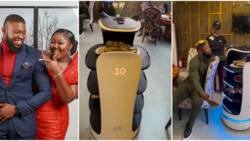 "In case Lolo do shakara": Actor Stan Nze shades wife as he visits Lagos restaurant where robots serve meals