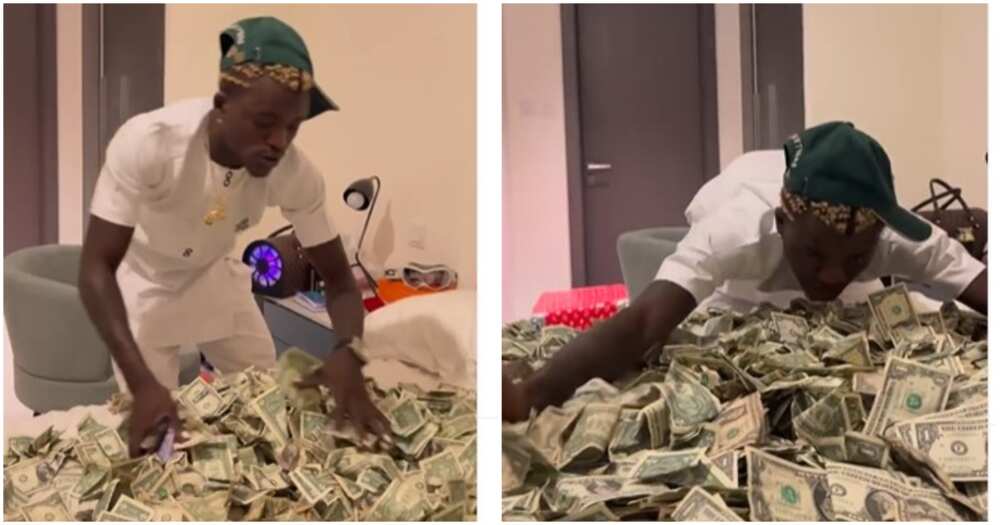 Zazu don cash out again: Portable says, shows off wads of foreign currency that takes an entire bed space