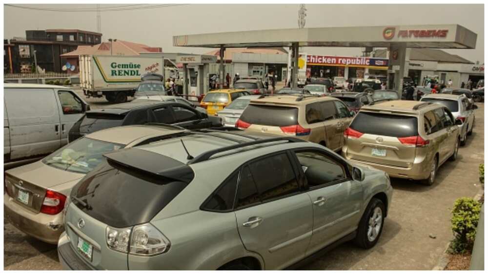 Fuel scarcity, petrol, filling station, Abuja, Lagos, fuel queues, Federal government, withdrawal of licences Fuel scarcity, petrol, filling station, Abuja, Lagos, fuel queues, Federal government, withdrawal of licences